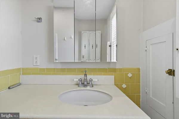 a bathroom with a shower and a tub