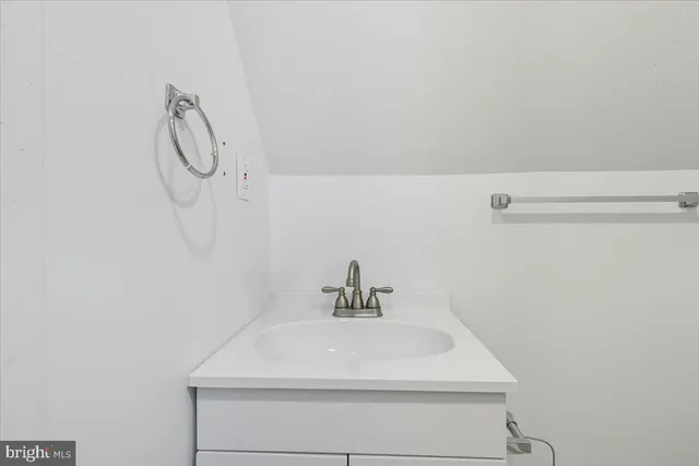 a house with a tree in front of it