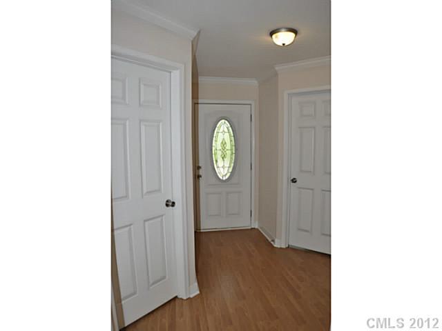 3968 Kiser Island Road, Unit 2 Terrell, NC 28682 - Photo 4 of 16 a view of a hallway with wooden floor