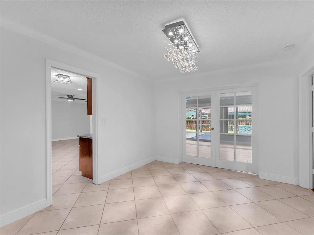 11762 Northwest 26th Court Coral Springs, FL 33065 - Photo 12 of 37 a view of an empty room with a window