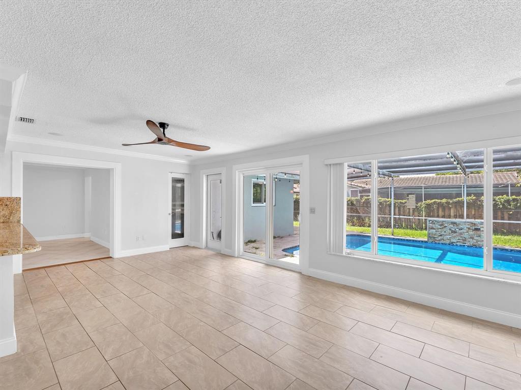 11762 Northwest 26th Court Coral Springs, FL 33065 - Photo 19 of 37 a view of an empty room with a window