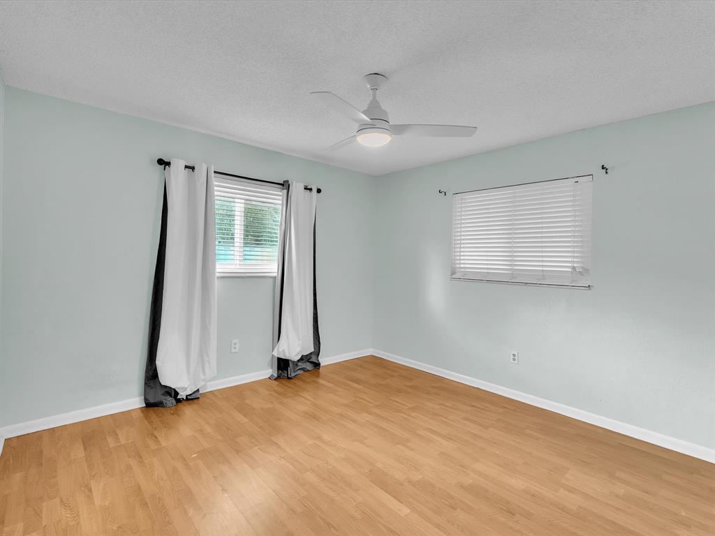11762 Northwest 26th Court Coral Springs, FL 33065 - Photo 30 of 37 a view of an empty room with a window