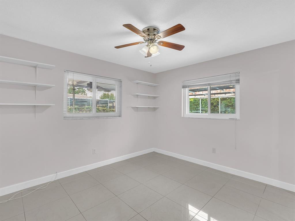 11762 Northwest 26th Court Coral Springs, FL 33065 - Photo 31 of 37 a view of an empty room with a window