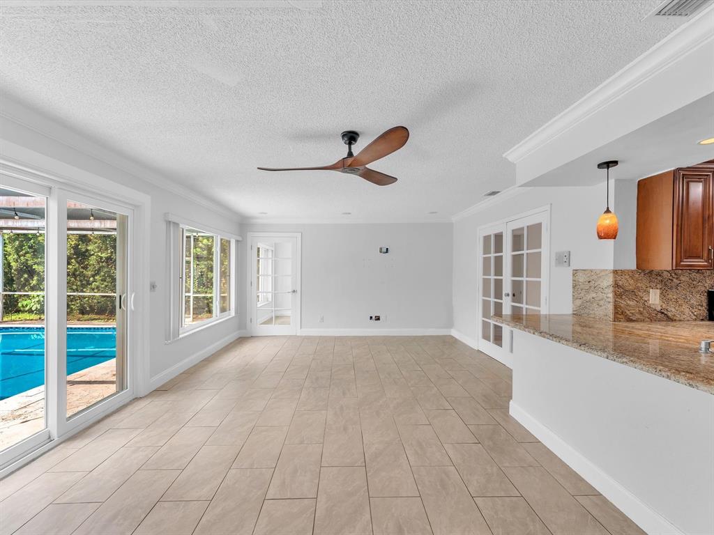 11762 Northwest 26th Court Coral Springs, FL 33065 - Photo 4 of 37 a view of an empty room with a window