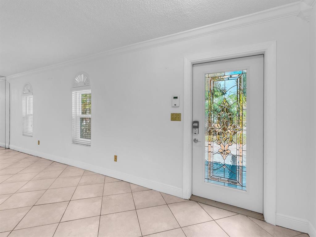 11762 Northwest 26th Court Coral Springs, FL 33065 - Photo 9 of 37 a view of an empty room with window