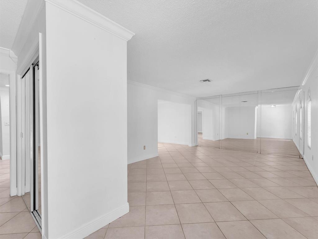 11762 Northwest 26th Court Coral Springs, FL 33065 - Photo 10 of 37 a view of an empty room and window