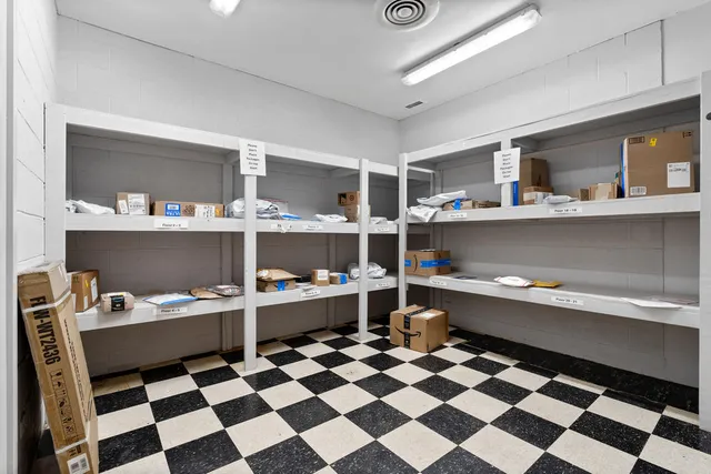 a bathroom with a glass shower door