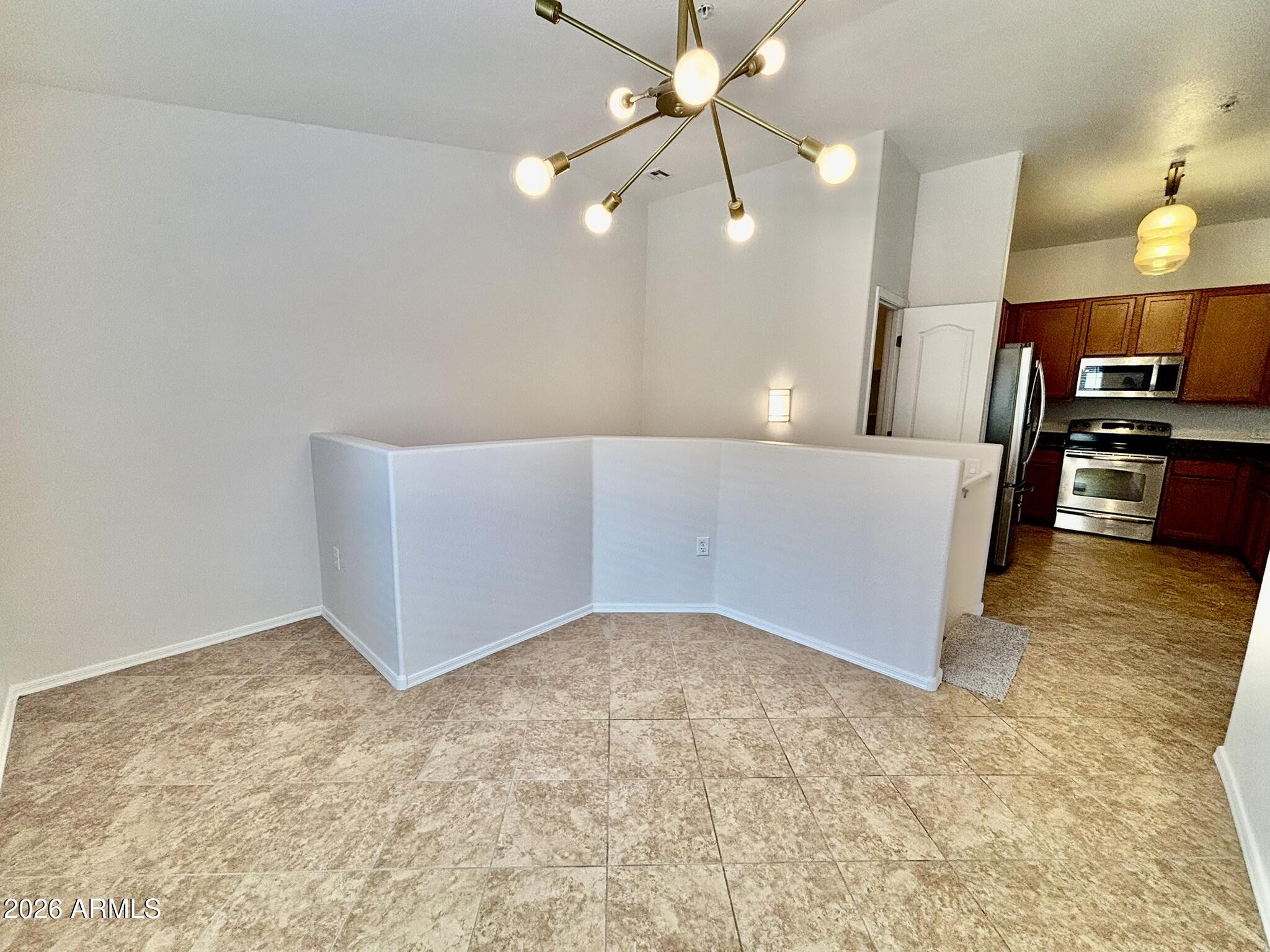 1350 South Greenfield Road, Unit 2041 Mesa, AZ 85206 - Photo 14 of 33 a living room with furniture and a flat screen tv