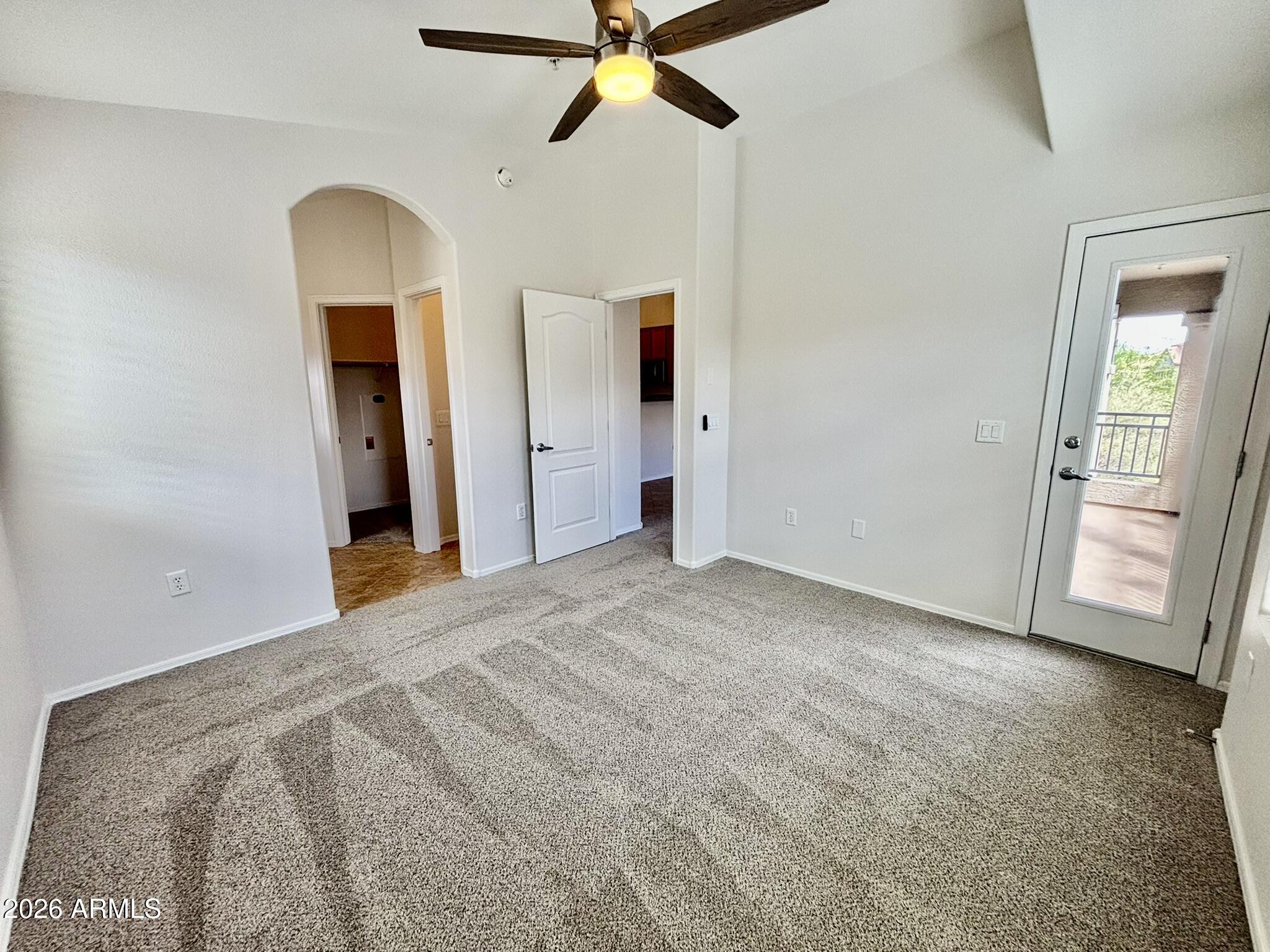 1350 South Greenfield Road, Unit 2041 Mesa, AZ 85206 - Photo 19 of 33 a view of empty room with ceiling fan