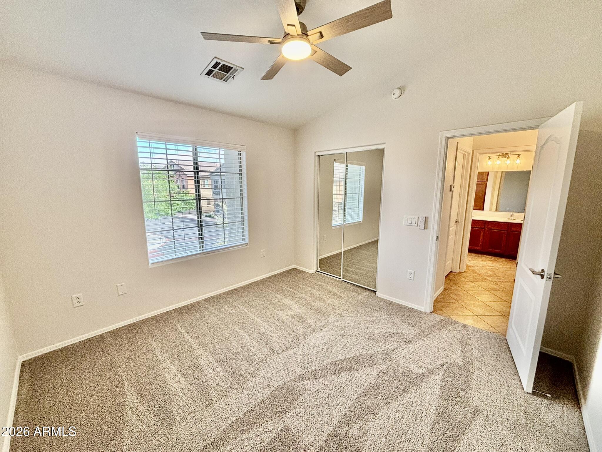 1350 South Greenfield Road, Unit 2041 Mesa, AZ 85206 - Photo 23 of 33 a view of empty room with wooden floor