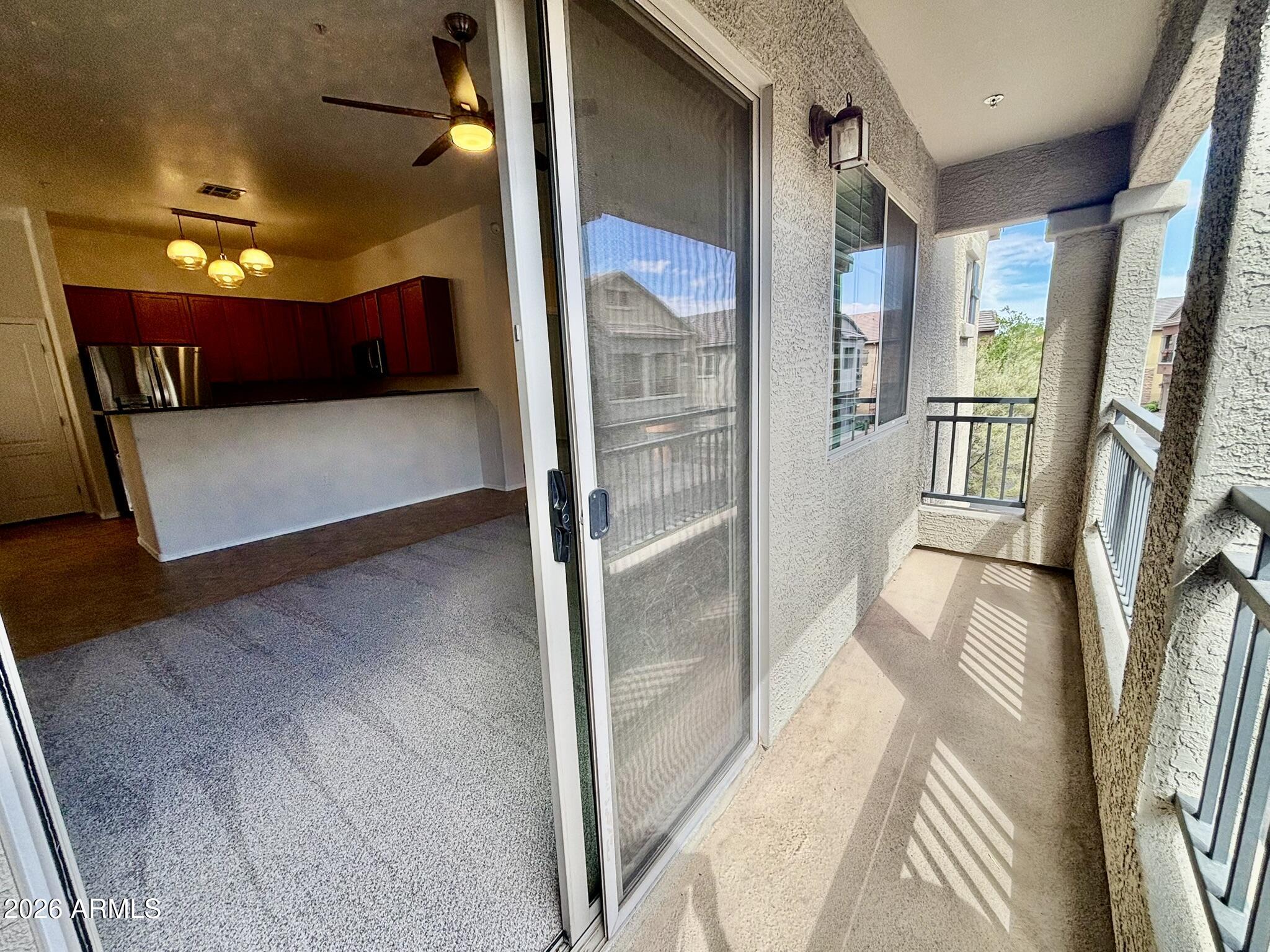 1350 South Greenfield Road, Unit 2041 Mesa, AZ 85206 - Photo 30 of 33 a view of a hallway with seating area