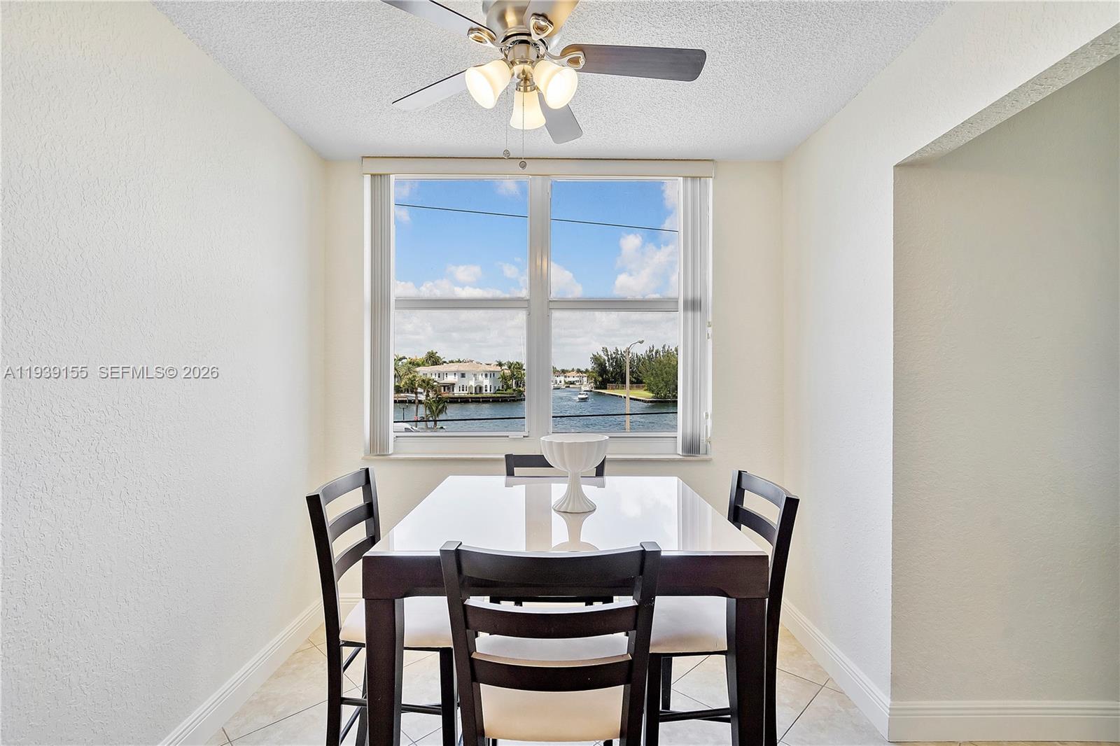 1401 South Ocean Drive, Unit 301 Hollywood, FL 33019 - Photo 13 of 48 a view of a dining room with furniture window and outside view