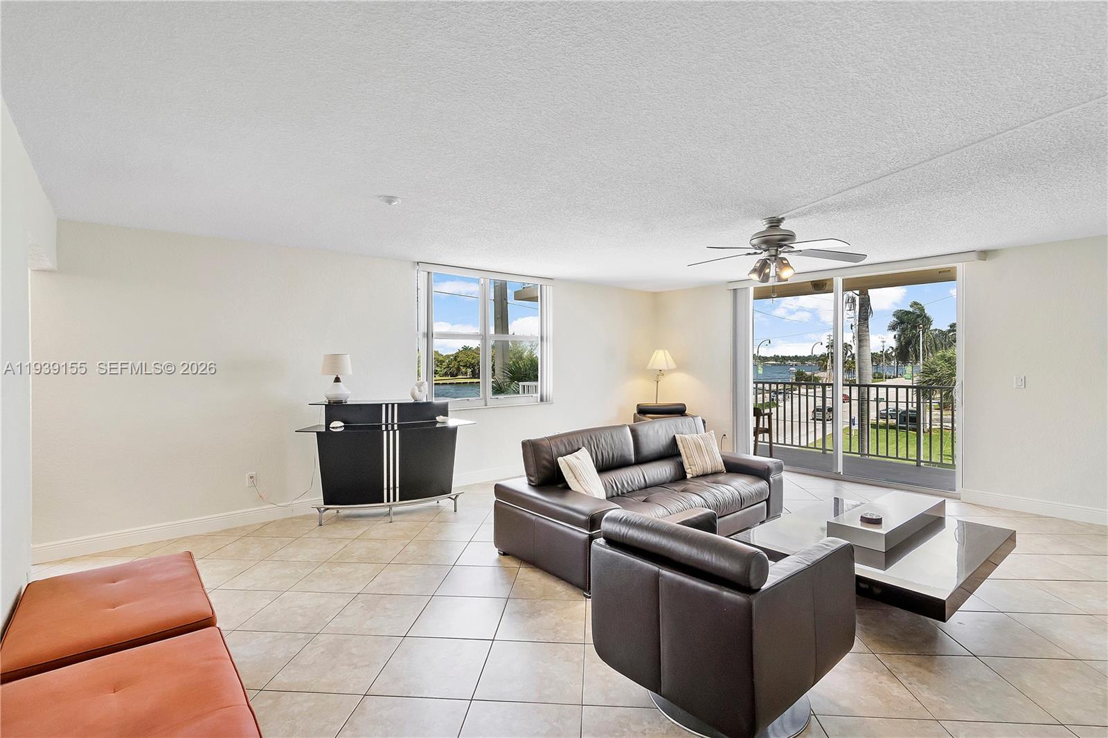 1401 South Ocean Drive, Unit 301 Hollywood, FL 33019 - Photo 14 of 48 a living room with furniture and a table