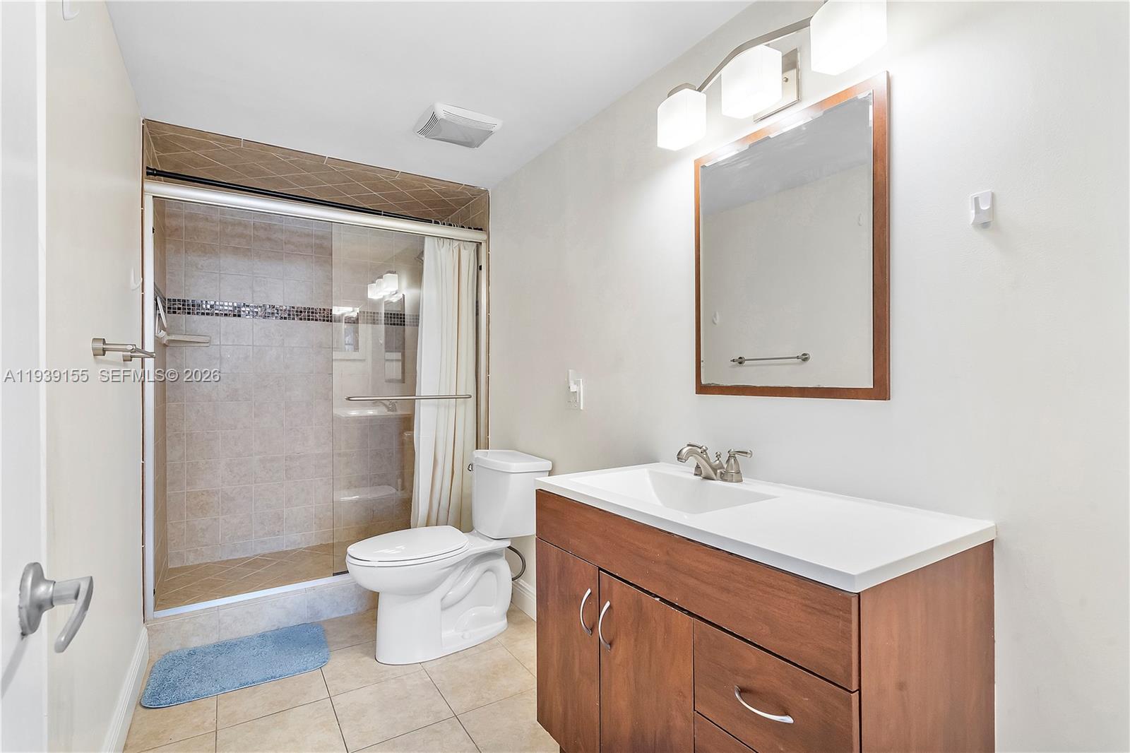 1401 South Ocean Drive, Unit 301 Hollywood, FL 33019 - Photo 23 of 48 a bathroom with a sink toilet and shower