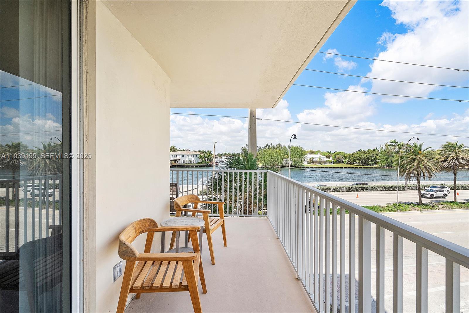 1401 South Ocean Drive, Unit 301 Hollywood, FL 33019 - Photo 30 of 48 a view of a balcony with wooden floor
