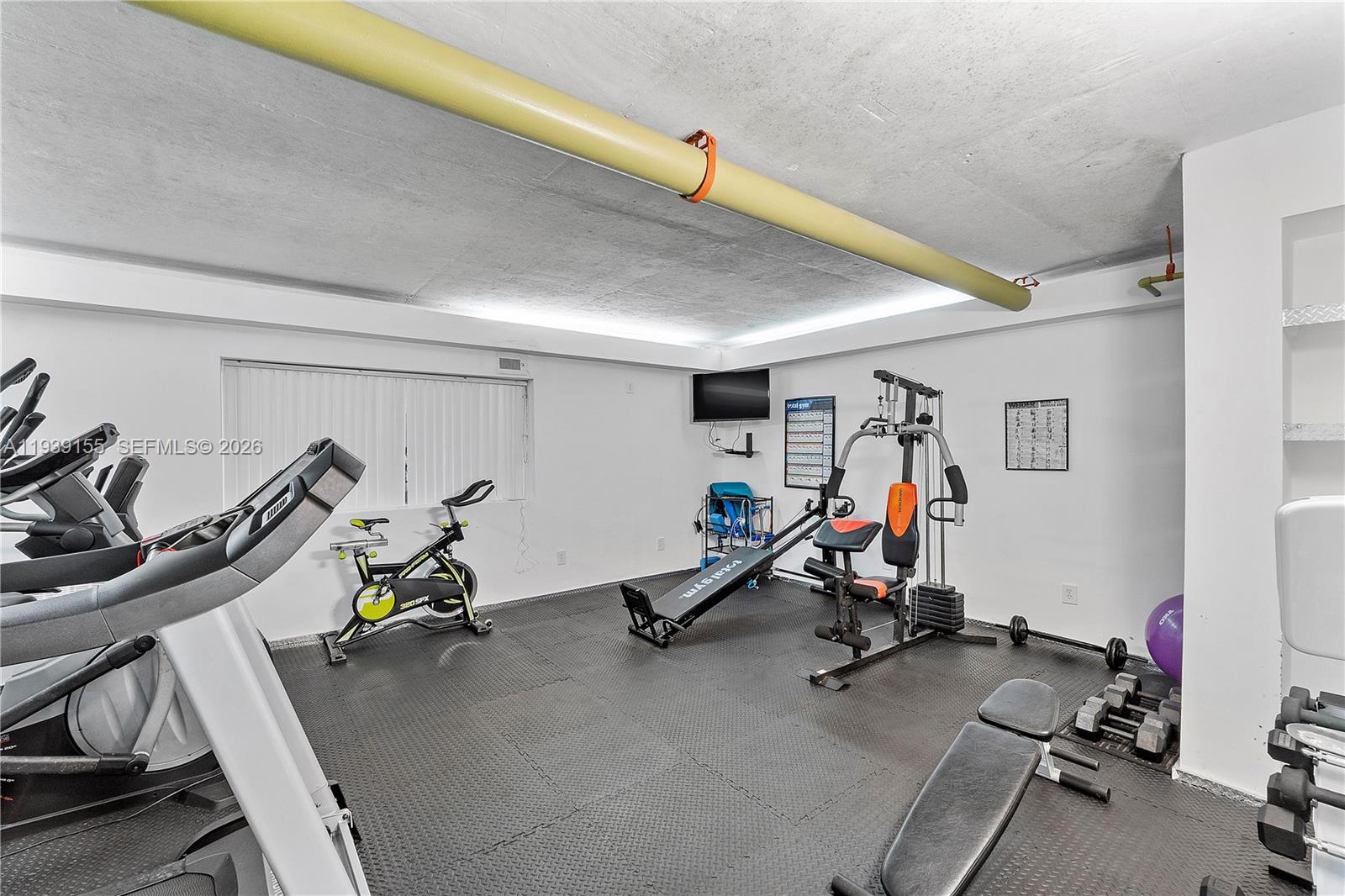 1401 South Ocean Drive, Unit 301 Hollywood, FL 33019 - Photo 35 of 48 a view of a room with gym equipment