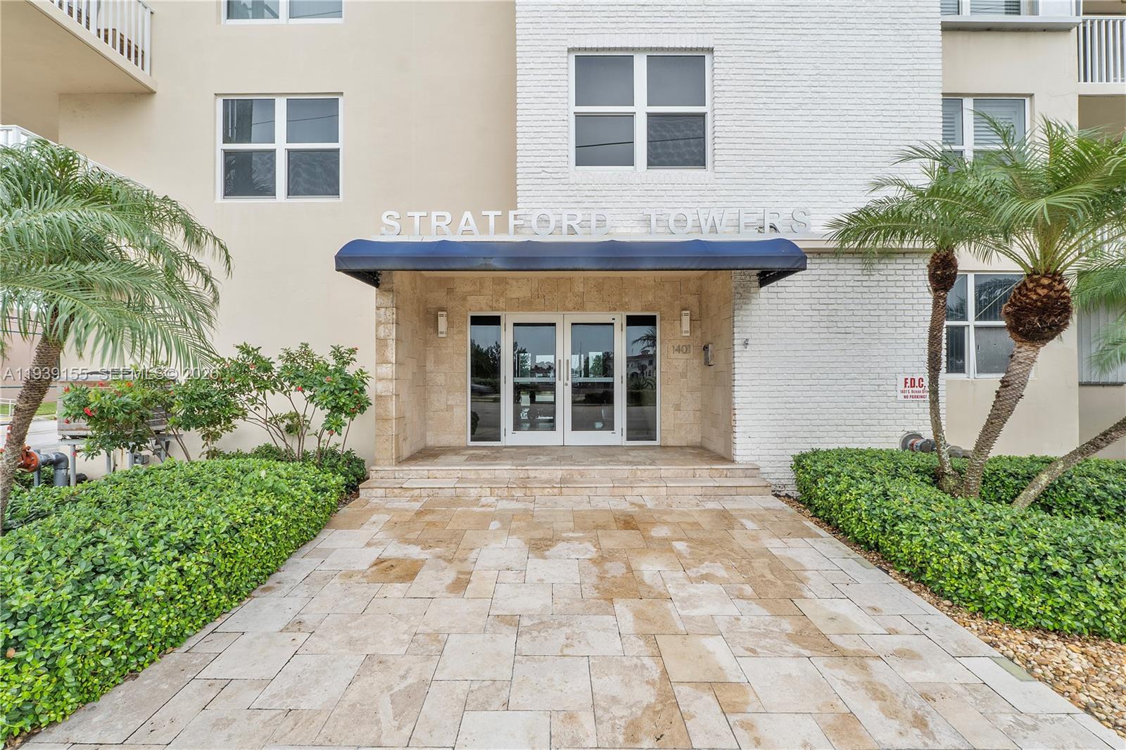 1401 South Ocean Drive, Unit 301 Hollywood, FL 33019 - Photo 39 of 48 a front view of a house with garden