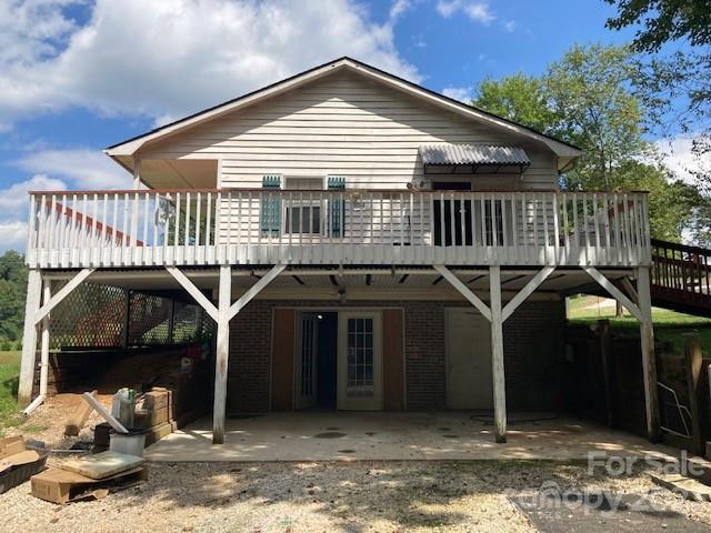 4660 Maple Creek Road Rutherfordton, NC 28139 - Photo 5 of 27 a front view of a house with a balcony