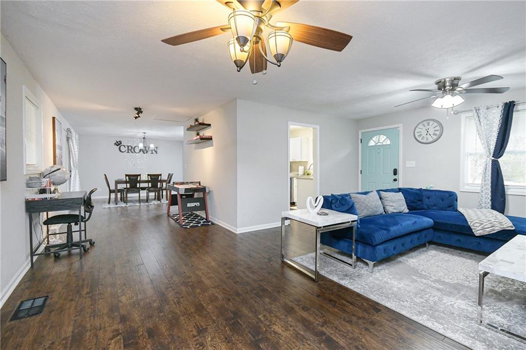 84 West Paulding Boulevard Dallas, GA 30157 - Photo 12 of 37 a living room with furniture and wooden floor