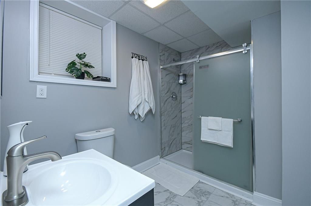84 West Paulding Boulevard Dallas, GA 30157 - Photo 22 of 37 a bathroom with a sink and toilet