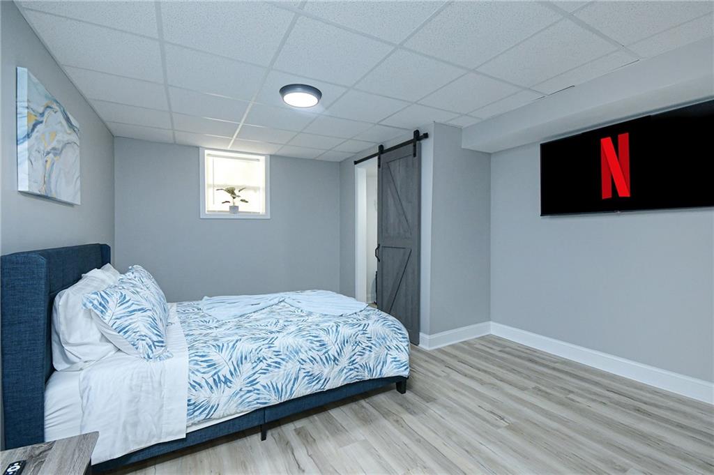 84 West Paulding Boulevard Dallas, GA 30157 - Photo 24 of 37 a bedroom with a bed and a window