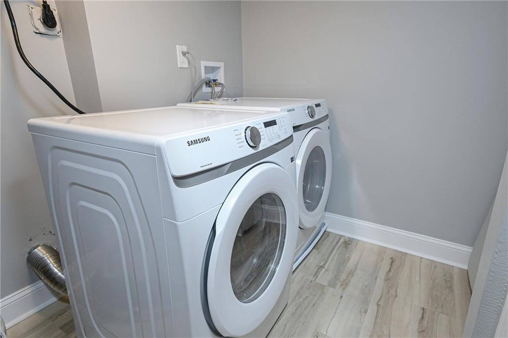84 West Paulding Boulevard Dallas, GA 30157 - Photo 25 of 37 a utility room with dryer and washer