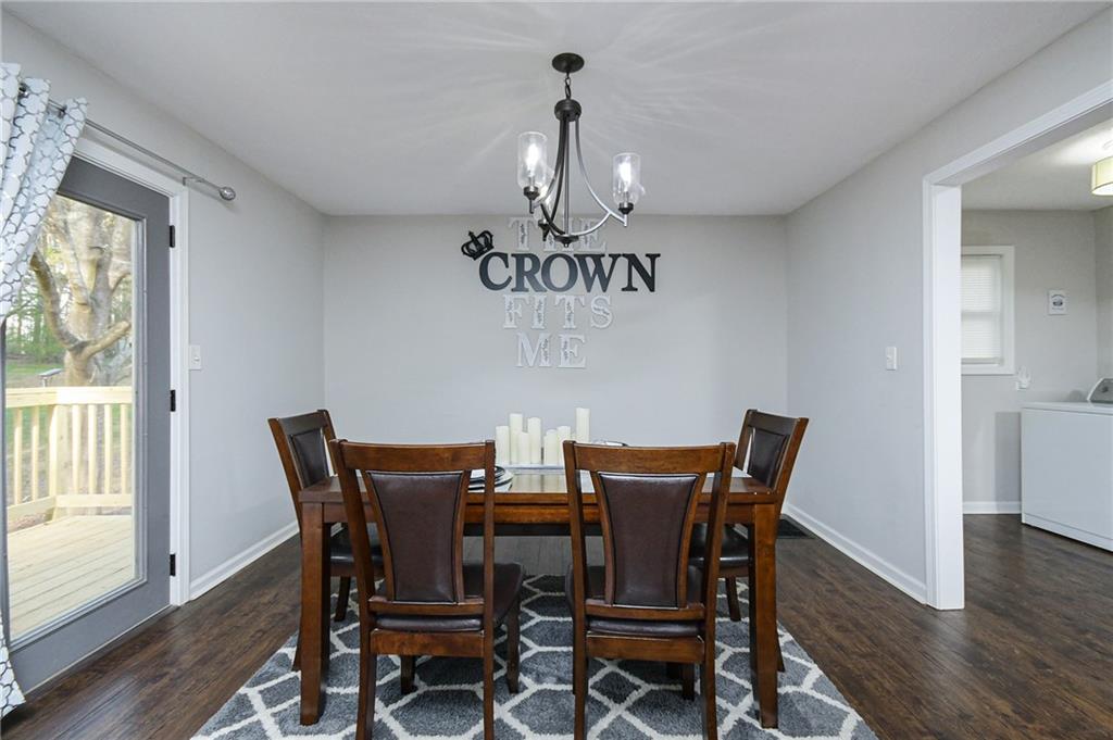 84 West Paulding Boulevard Dallas, GA 30157 - Photo 30 of 37 a view of a dining room with furniture window and wooden floor