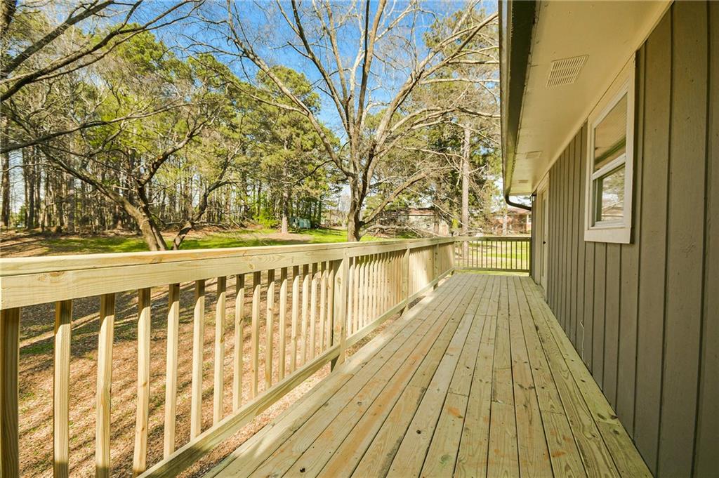84 West Paulding Boulevard Dallas, GA 30157 - Photo 34 of 37 a view of a balcony with wooden floor