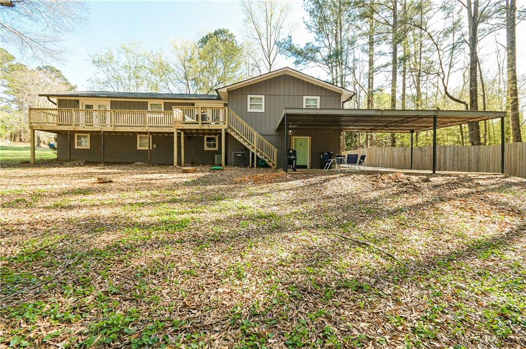 84 West Paulding Boulevard Dallas, GA 30157 - Photo 35 of 37 a front view of a house with a garden