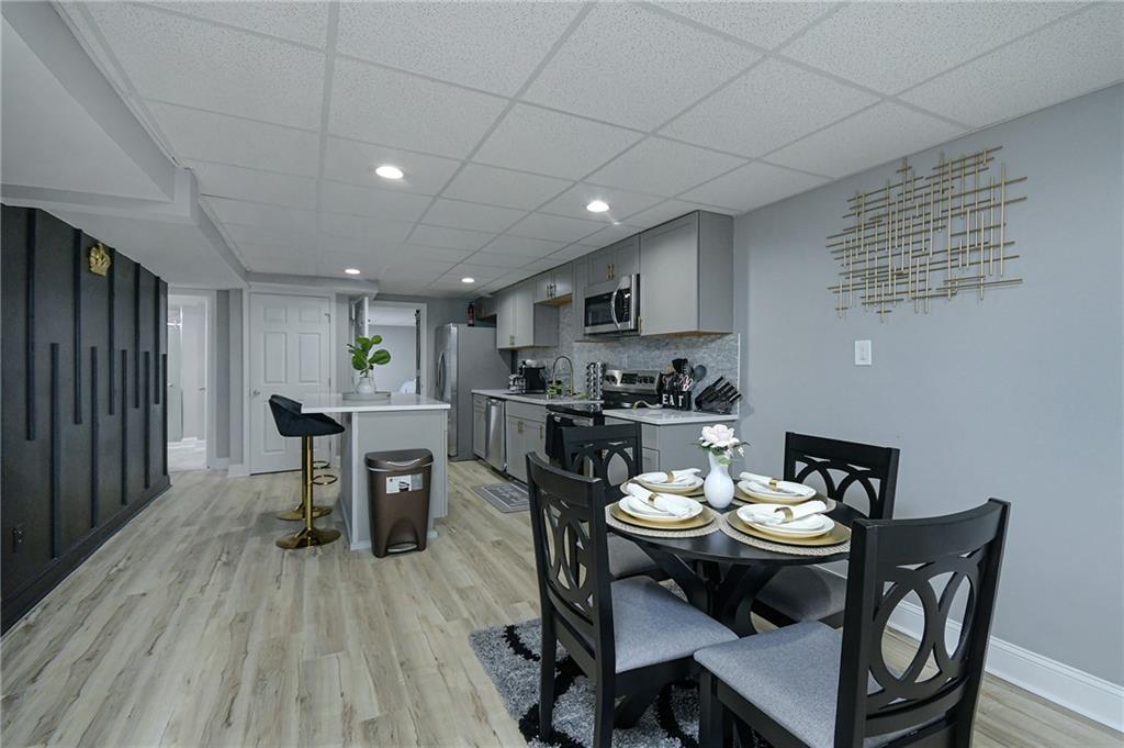 84 West Paulding Boulevard Dallas, GA 30157 - Photo 8 of 37 a view of a dining room with furniture and wooden floor