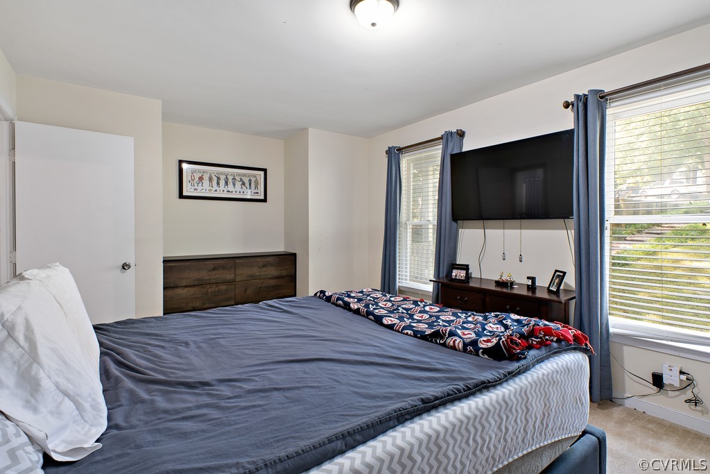 5022 Wilconna Road Chesterfield, VA 23832 - Photo 14 of 27 a bedroom with a bed and a flat screen tv