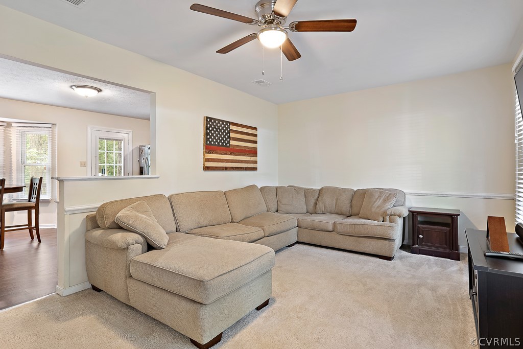 5022 Wilconna Road Chesterfield, VA 23832 - Photo 6 of 27 a living room with furniture and a ceiling fan