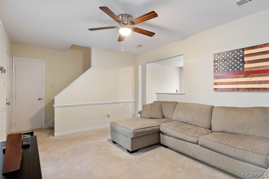 5022 Wilconna Road Chesterfield, VA 23832 - Photo 7 of 27 a living room with furniture and a ceiling fan