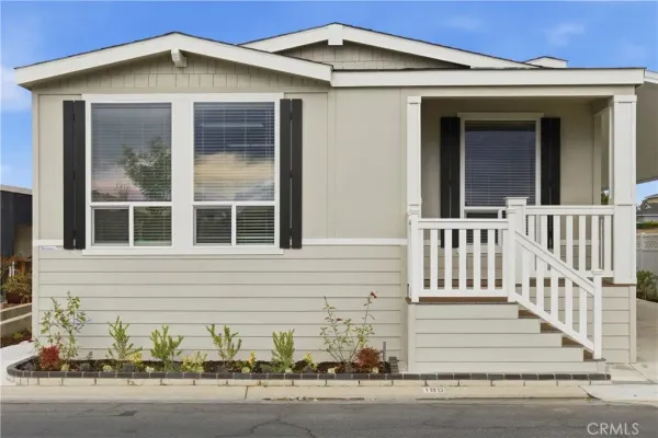 a view of a walk in closet and balcony