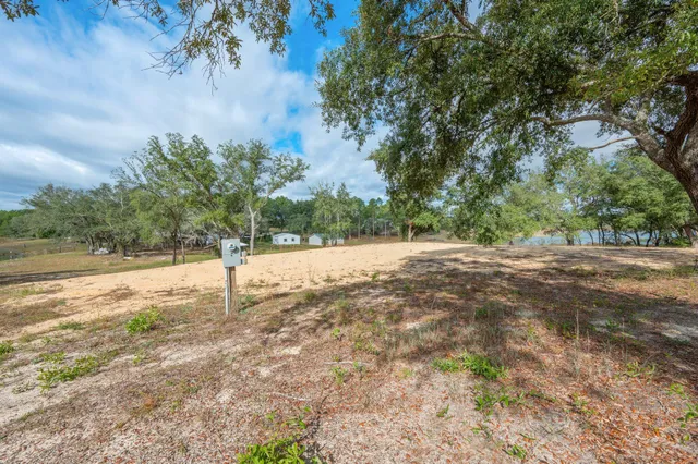 a street sign that is on the side of a road