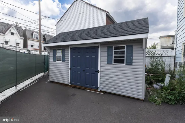 a view of a house with a garage
