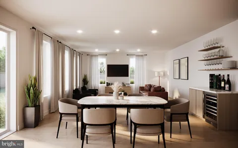 a dining room with furniture and window