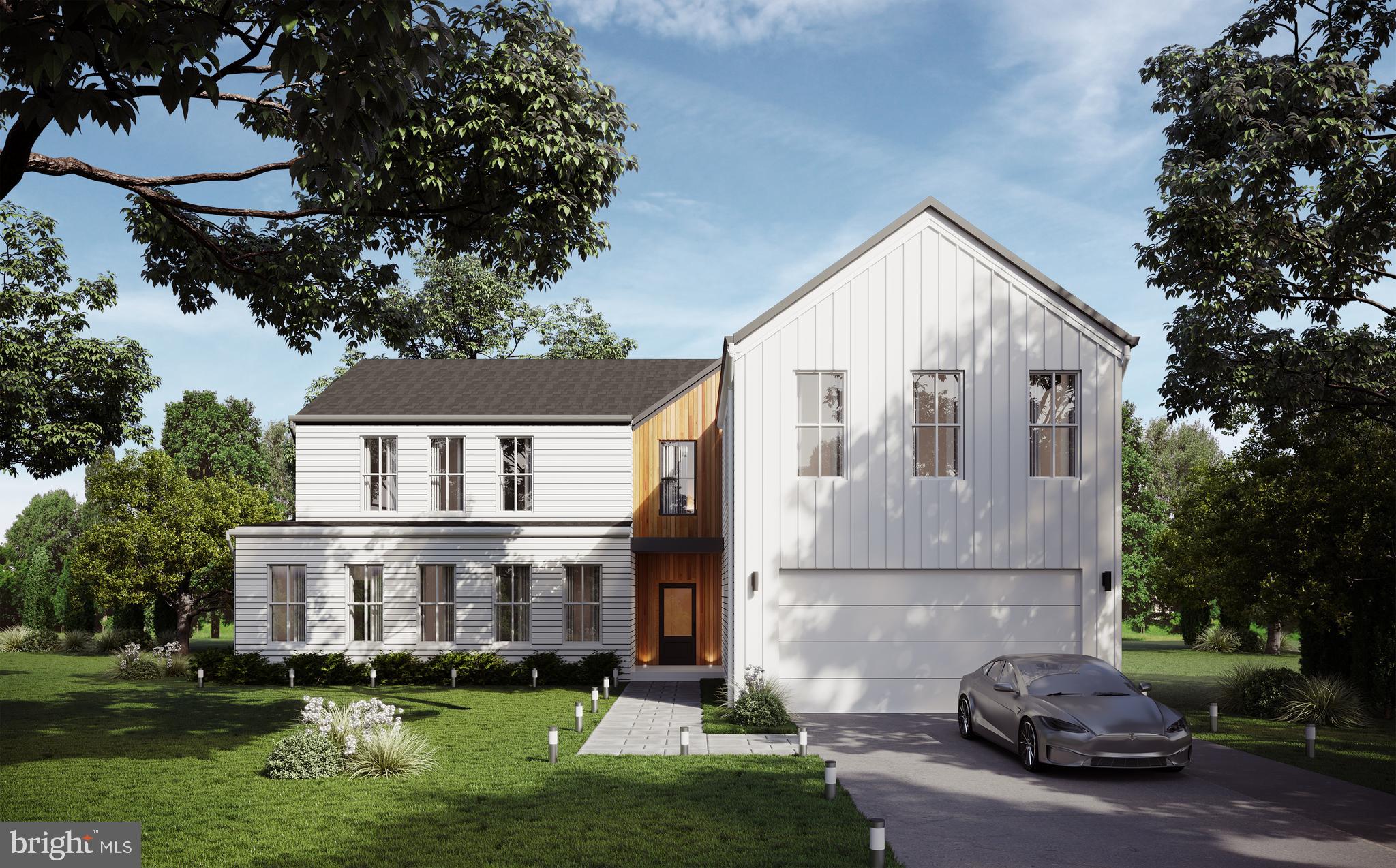 9-3 Walnut Ridge Road Wilmington, DE 19807 - Photo 2 of 21 a view of a white house next to a yard with big trees