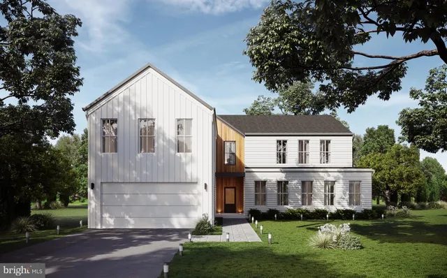 a view of front of house with a yard