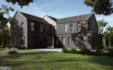 a house with garden in front of it