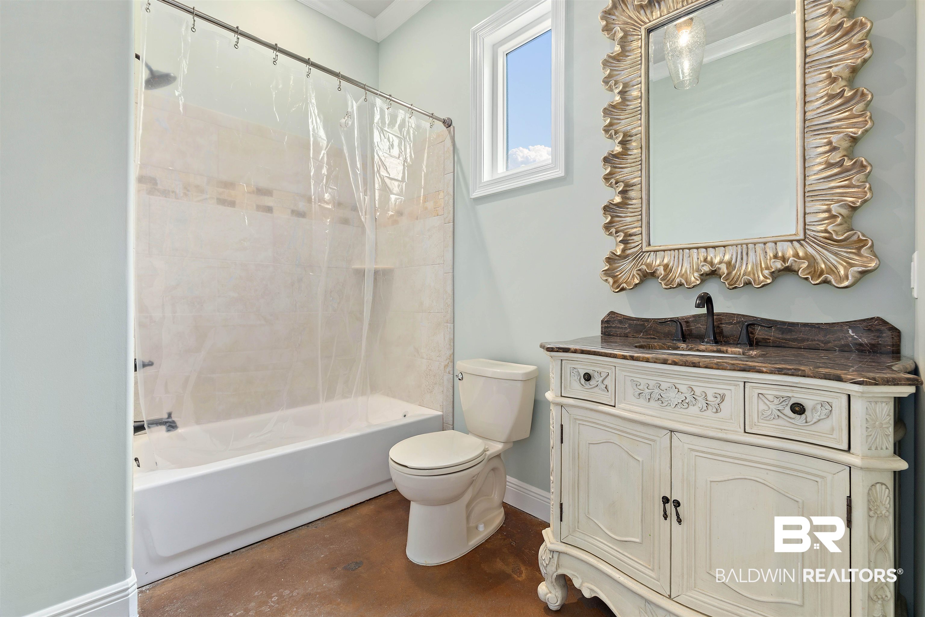 3584 Rue Royal Mobile, AL 36693 - Photo 24 of 35 Full bath with baseboards, toilet, shower / tub combo with curtain, and vanity