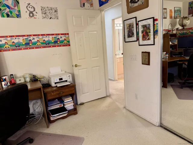 a bedroom with furniture and a bed