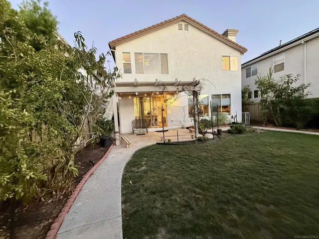 a view of a garden with a patio