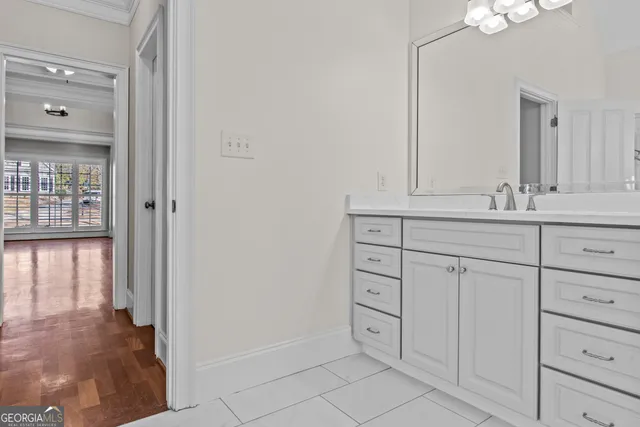 a bathroom with a sink and vanity