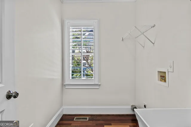 a view of small space with racks on the wall