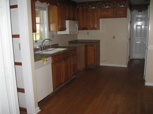 1261 Mountain Pass Road Blue Ridge, VA 24064 - Photo 11 of 23 a kitchen with stainless steel appliances granite countertop a refrigerator and a sink