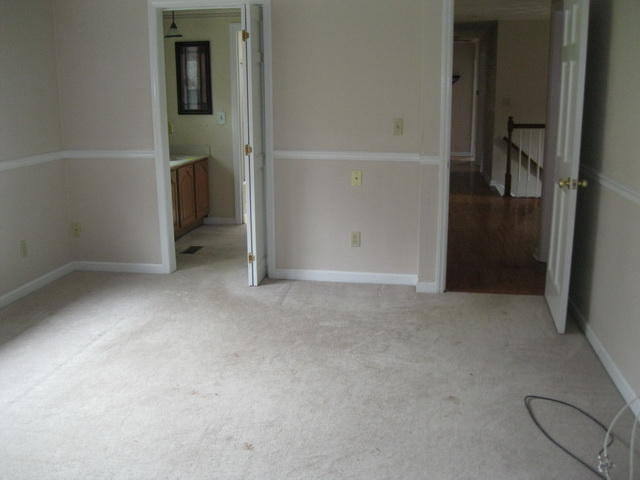 1261 Mountain Pass Road Blue Ridge, VA 24064 - Photo 18 of 23 an empty room with an entrance to other room