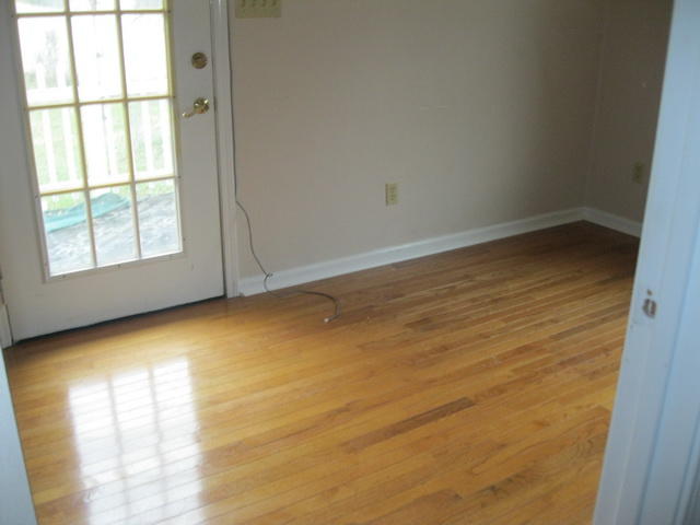 1261 Mountain Pass Road Blue Ridge, VA 24064 - Photo 23 of 23 an empty room with a window