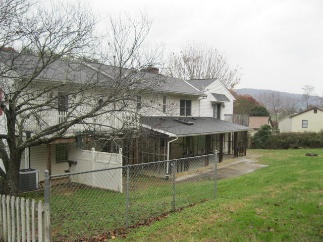 1261 Mountain Pass Road Blue Ridge, VA 24064 - Photo 4 of 23 a view of a house with a backyard
