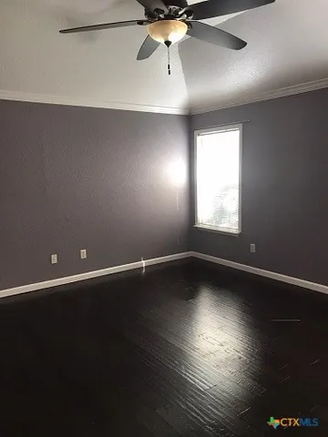 a bathroom with a sink vanity tub and a mirror